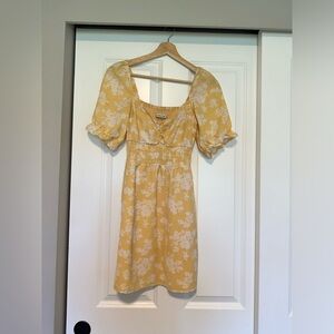 Midi yellow dress with white floral print great dress for spring/summer.